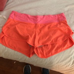 Coral and pink lululemon speed shorts